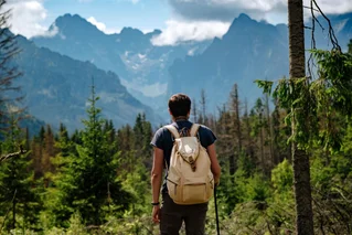 man hiking in mountains